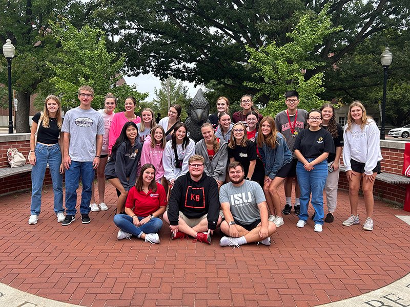 A group of students posing at the Welcome week event