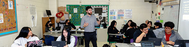 Professor lecturing in class.